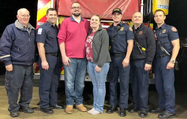 Dan Sherrod and his  fiancée, Gabrielle Hall, visited with public safety members who helped save Sherrod's life.