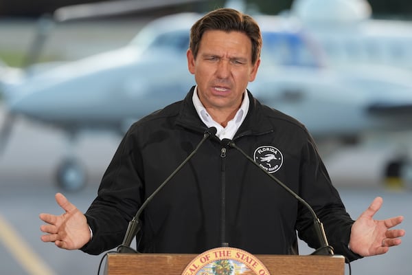 Florida Gov. Ron DeSantis speaks during a press conference on immigration enforcement at a U.S. Customs and Border Protection hangar on Homestead Air Force Base, Wednesday, Feb. 26, 2025, in Homestead, Fla. (AP Photo/Rebecca Blackwell)