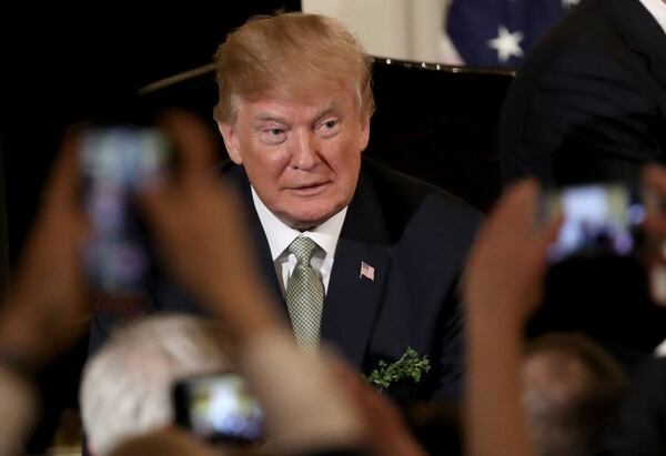 President Donald Trump greets supporters at the White House following an event with Irish Prime Minister Leo Varadkar March 15, 2018 in Washington, DC. 