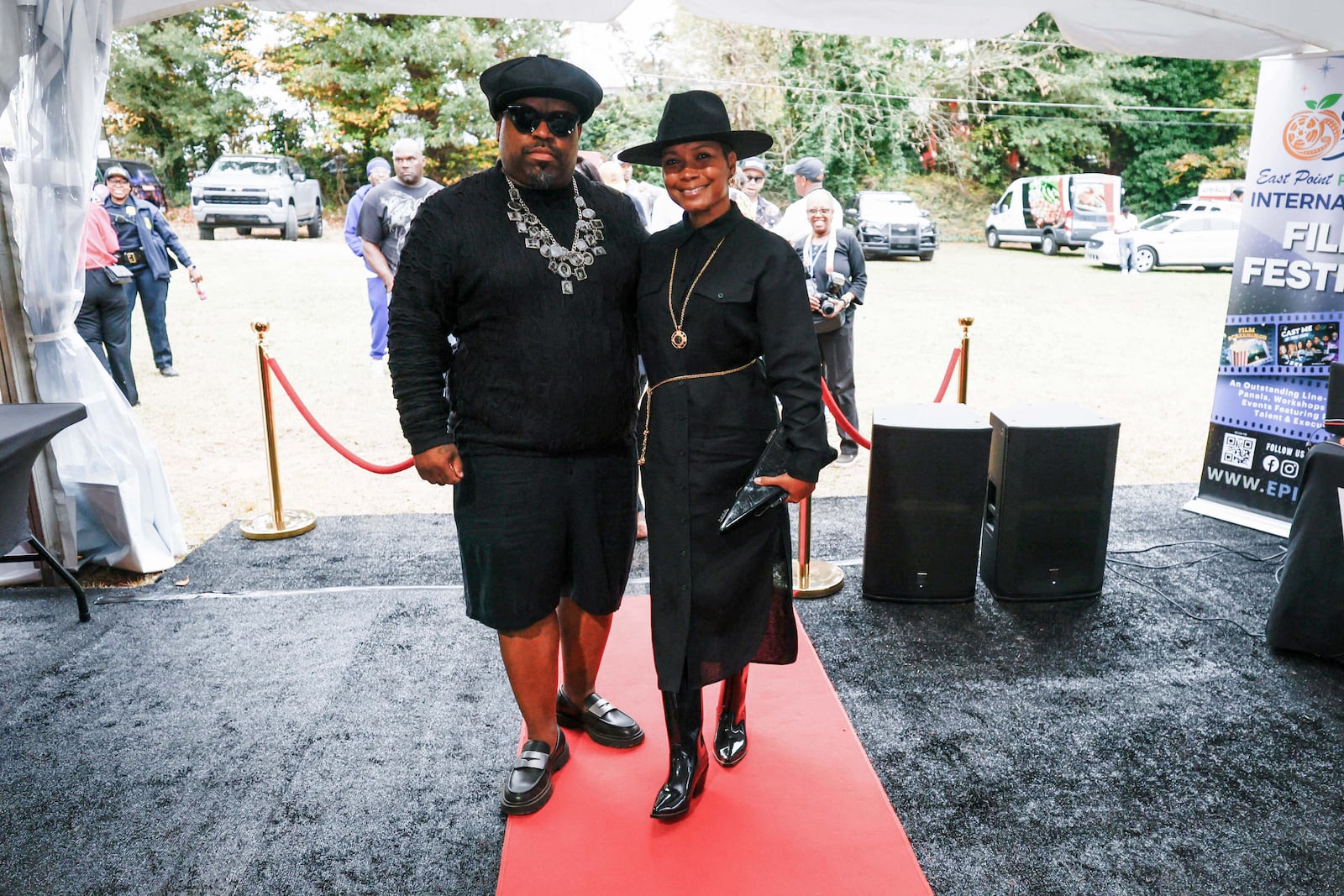 Former Goodie Mob member, singer, and songwriter CeeLo Green poses with his wife, Shani James, as they arrive in East Point to celebrate the life and legacy of Rico Wade on Thursday, Nov. 7, 2024. 
(Miguel Martinez / AJC)