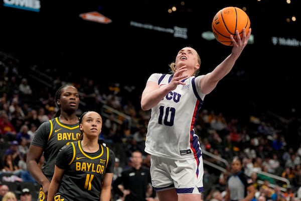 TCU guard Hailey Van Lith (10) puts up a shot during the second half of an NCAA college basketball game against Baylor for the Big 12 women's tournament championship Sunday, March 9, 2025, in Kansas City, Mo. (AP Photo/Charlie Riedel)