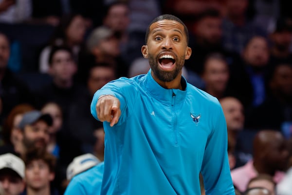 Charlotte Hornets head coach Charles Lee directs his team against the Cleveland Cavaliers during the first half of an NBA basketball game in Charlotte, N.C., Friday, March 7, 2025. (AP Photo/Nell Redmond)