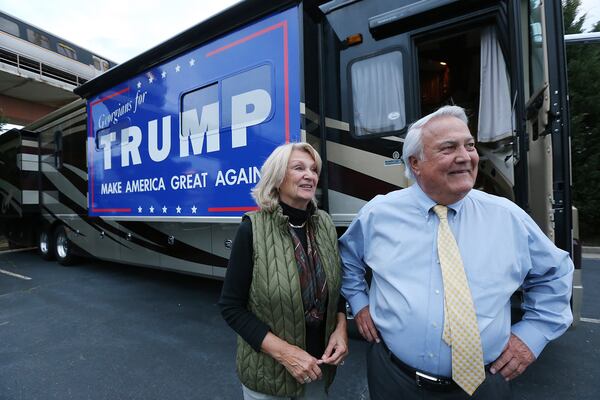 Georgia Public Service Commissioner Lauren "Bubba" McDonald, Jr., a Donald Trump supporter, and his wife Shelley speak to a reporter after arriving in their recreational vehicle at the Corey Center for a watch party on Monday, March 1, 2016, Atlanta. Curtis Compton / ccompton@ajc.com