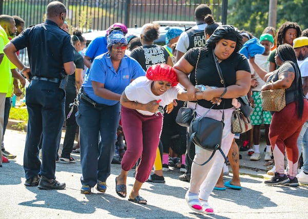 Friends and family members react to the news after an Atlanta mother was shot to death Tuesday morning.

