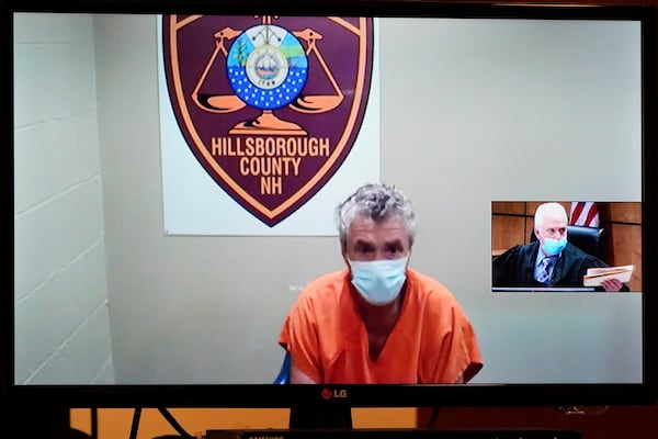 FILE - Bradley Asbury is arraigned via video as Judge William Lyons presides, at right, at Manchester, N.H., April 8, 2021. (AP Photo/Elise Amendola, Pool, File)