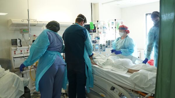 Staff at Phoebe Putney Memorial Hospital in Albany care for a patient on the COVID-19 unit in this undated photo. The hospital made international headlines in spring 2020 as it handled what was for a time one of the most intense outbreaks on the globe. In this wave, what the hospital has handled is worse. (Photo courtesy of Phoebe Putney)