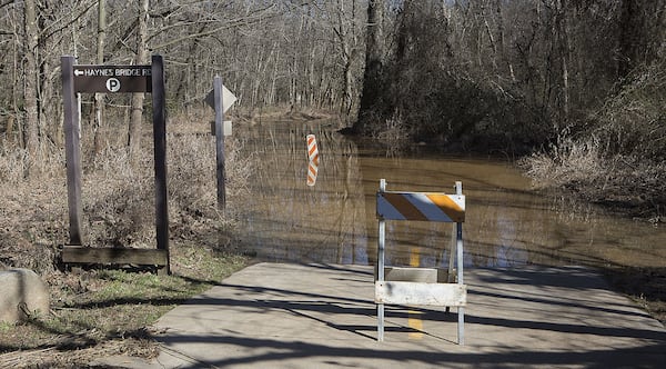 Parts of Big Creek near Alpharetta off Haynes Bridge road were closed Thursday due to the rain from Wednesday’s storms. (Credit: Phil Skinner)