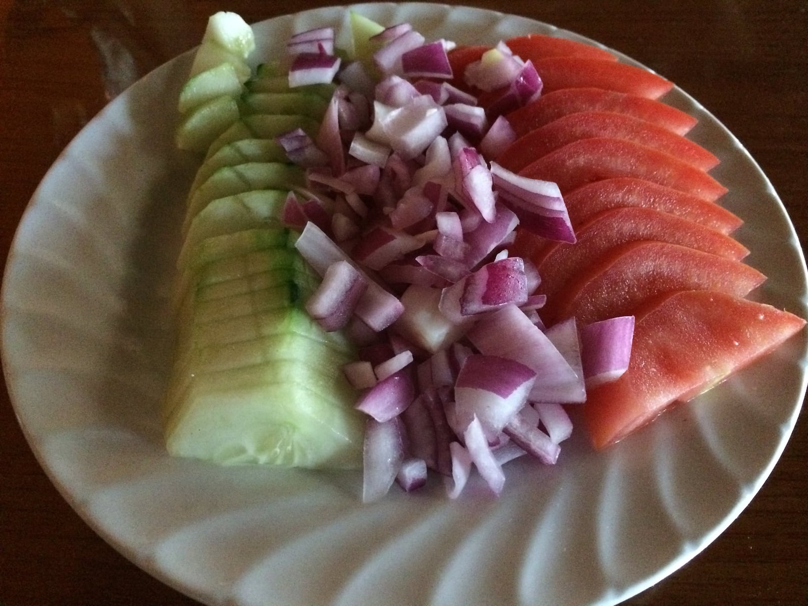 Salads at Euro Gourmet Grill are plain and simple, like this undressed plate of cucumber, onion and tomato. CONTRIBUTED BY WENDELL BROCK