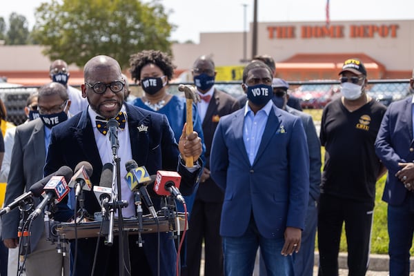 The Rev. Jamal Harrison Bryant, senior pastor of New Birth Missionary Baptist Church, speaks during a press conference to announce a boycott of Home Depot over inaction on recent voting legislation in Georgia, across from a Home Depot in Decatur, Ga. on April 20th, 2021. PHOTO BY NATHAN POSNER