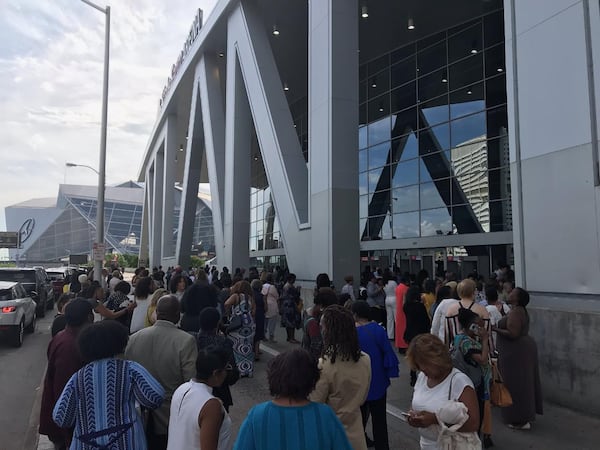 Hours before the event was scheduled to begin, admirers of former first lady Michelle Obama were lined up at State Farm Arena on Saturday, May 11, 2019. Atlanta was the next-to-last stop on Obama's book tour for her memoir, "Becoming." (Photo: TYLER ESTEP/AJC)