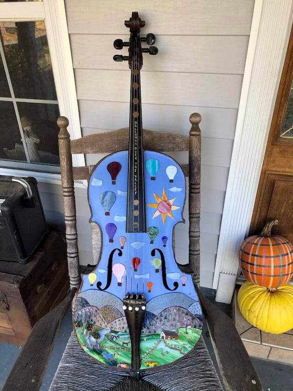 Jeff Carlisle transforms found objects like this cello with stained glass.
Courtesy of Paradise Garden Foundation