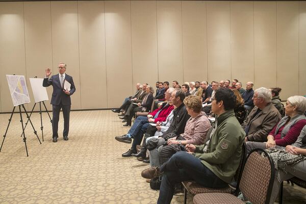 Attorney William “Woody” Galloway, of the Galloway Law Group, presents building and zoning plans to a group of DeKalb County residents during a public information meeting Thursday, January 2, 2020. (ALYSSA POINTER/ALYSSA.POINTER@AJC.COM)