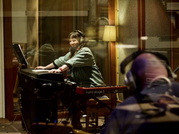 Camera Obscura keyboard player Donna Maciocia enjoys a studio moment during recording of the group's new album "Look to the East, Look to the West."
(Courtesy of Merge Records)