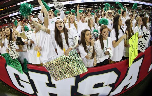 December 14, 2012 - Atlanta, Ga: Buford fans cheer during the first half of their game against St. Pius in the GHSA Class AAA High School Football Final at the Georgia Dome Friday afternoon in Atlanta, Ga., December 14, 2012. Buford has reached the finals for a record sixth consecutive season and can win an eighth title in 12 seasons, something matched only by Valdosta (1951-62 and 1960-71). JASON GETZ / JGETZ@AJC.COM The Class AAAA championship is a rematch of the 2012 Class AAA state championship between Buford and St. Pius. Both teams moved up in class this season. (Jason Getz / AJC File)