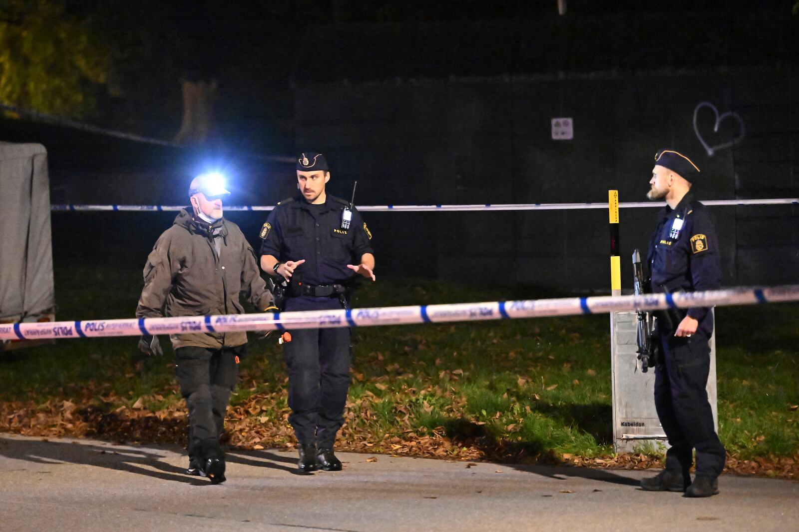 Police guard outside the Israeli embassy in Stockholm, Sweden, Tuesday, Oct. 1, 2024, after a suspected shooting near the embassy. (Anders Wiklund/TT News Agency via AP)