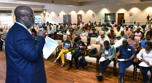 Dwight Robinson, chief appraiser, speaks before Fulton County residents during a June 2017 town hall meeting in advance of a meeting of the county’s Board of Assesssors to determine if they will uphold the current property assessments. HYOSUB SHIN / HSHIN@AJC.COM