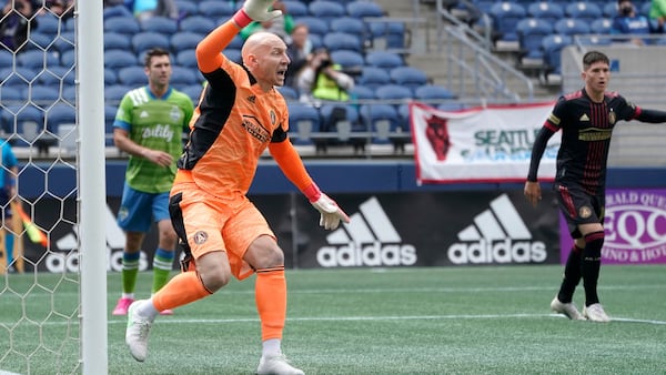 Atlanta United goalkeeper Brad Guzan signals from the goal during the second half against the Seattle Sounders, Sunday, May 23, 2021, in Seattle. The game ended in a 1-1 draw. (Ted S. Warren/AP)