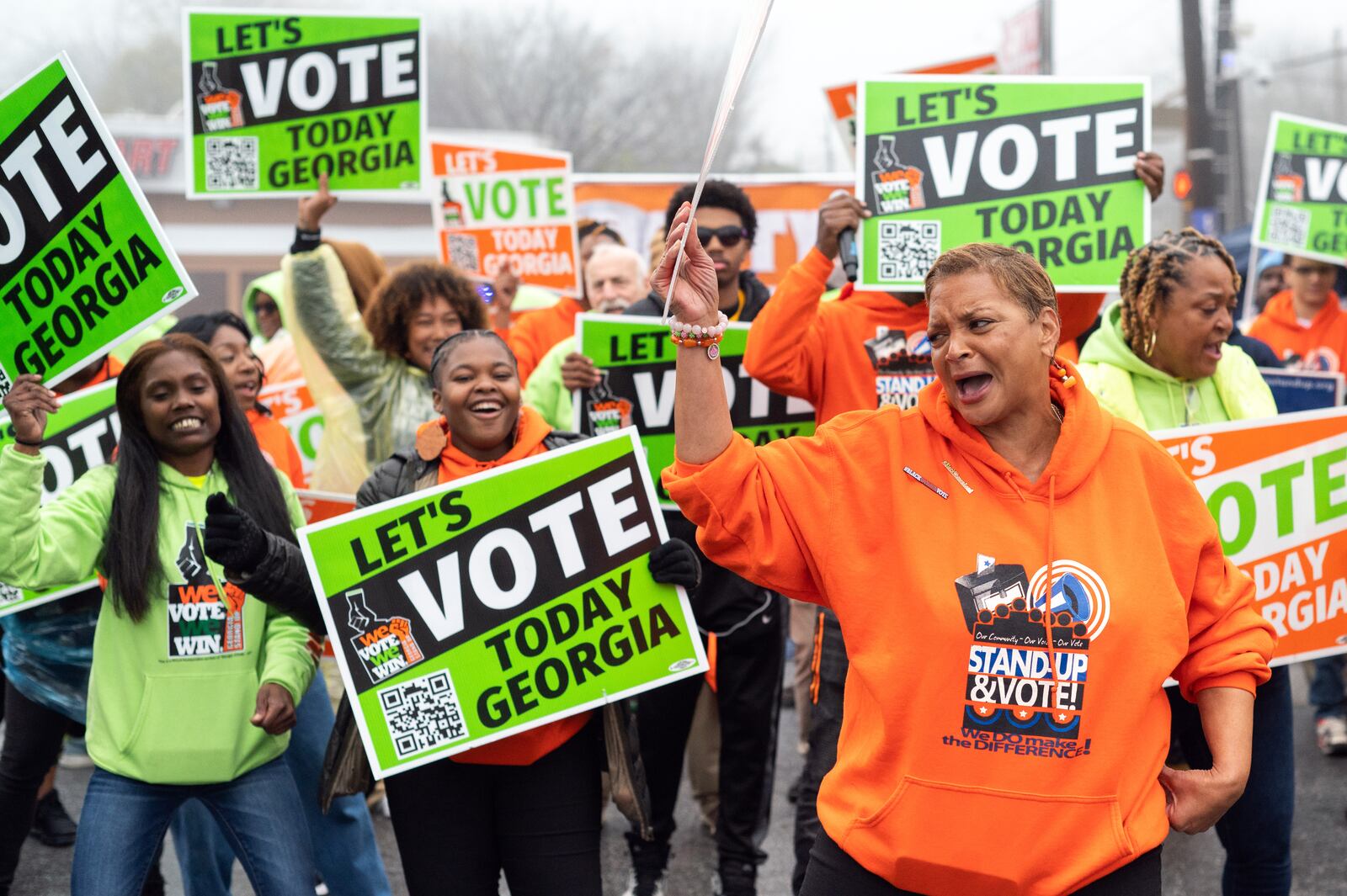 An independent post-election poll conducted by the University of Georgia sheds light on Georgians’ satisfaction with their voting experience in the 2022 elections.  Among the findings: more than 90% said it was easy to cast a ballot. Pictured is a get-out-the-vote event on Election Day, Nov. 6, 2022. (Nicole Buchanan/The New York Times)