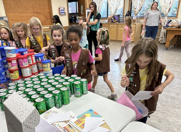 The birthday bags go to food pantries, domestic violence shelters, and foster care programs in Cherokee and Cobb counties so children in need can celebrate their special day in style. Courtesy of Girl Scout Troop 23134