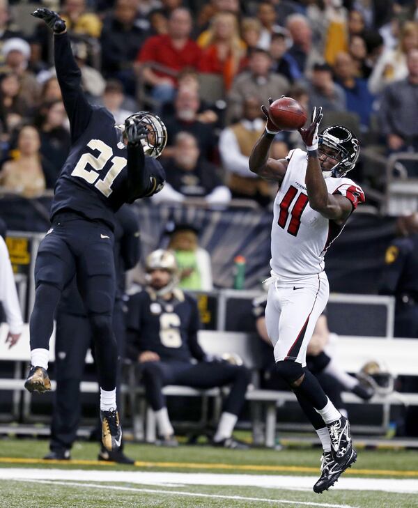 New Orleans Saints cornerback Patrick Robinson (21) leaps to defend a reception by Atlanta Falcons wide receiver Julio Jones (11) in the second half of an NFL football game in New Orleans, Sunday, Dec. 21, 2014. (AP Photo/Rogelio Solis) New Orleans Saints cornerback Patrick Robinson (21) leaps to defend a reception by Atlanta Falcons wide receiver Julio Jones (11) in the second half of an NFL football game in New Orleans, Sunday, Dec. 21, 2014. (AP Photo/Rogelio Solis)