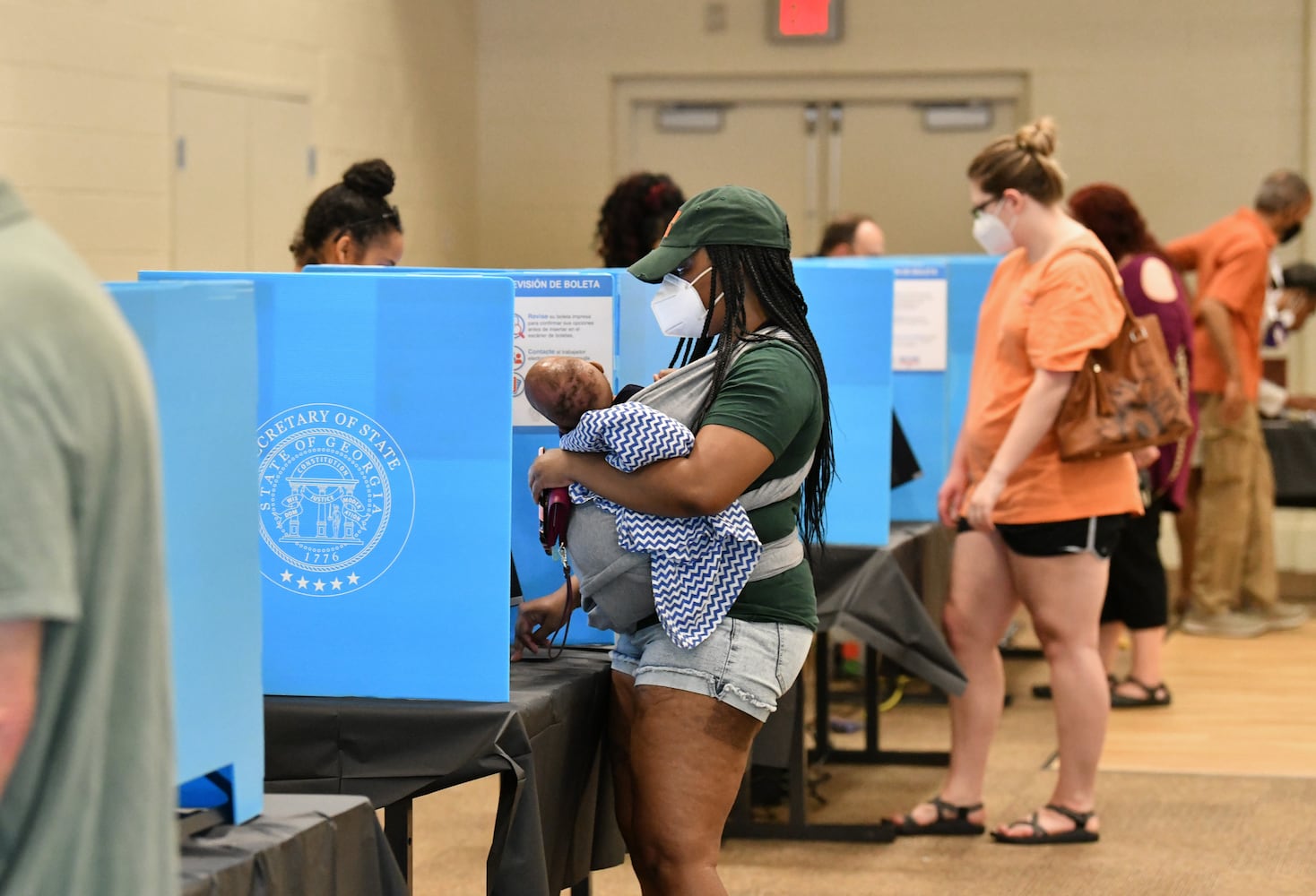 PHOTOS: Georgia voters struggle with long lines, new equipment, social distancing