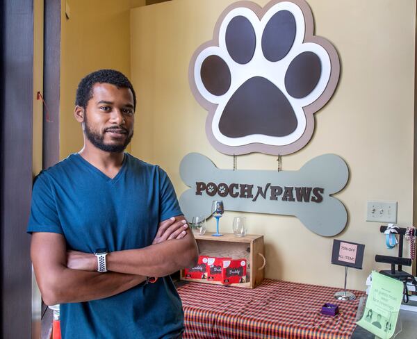 Pooch N Paws general manager Daniel Burton poses for a photograph in his Suwanee store on August 10, 2020. STEVE SCHAEFER FOR THE ATLANTA JOURNAL-CONSTITUTION