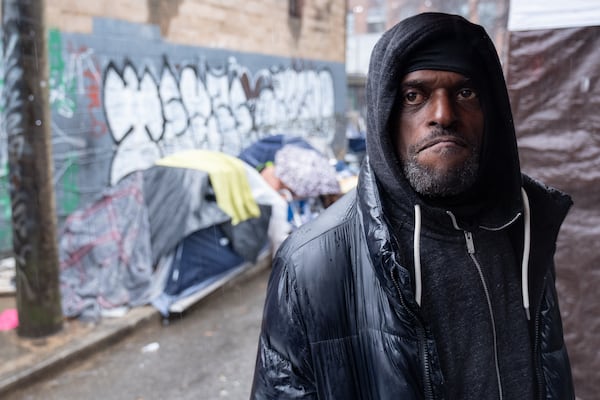 Gus Hendrix, who lives in the Old Wheat Street encampment in Atlanta, spoke Wednesday, Feb. 12, 2025, spoke about his friend Cornelius Taylor, who died as the city tried to clear the encampment.  Ben Gray for the Atlanta Journal-Constitution