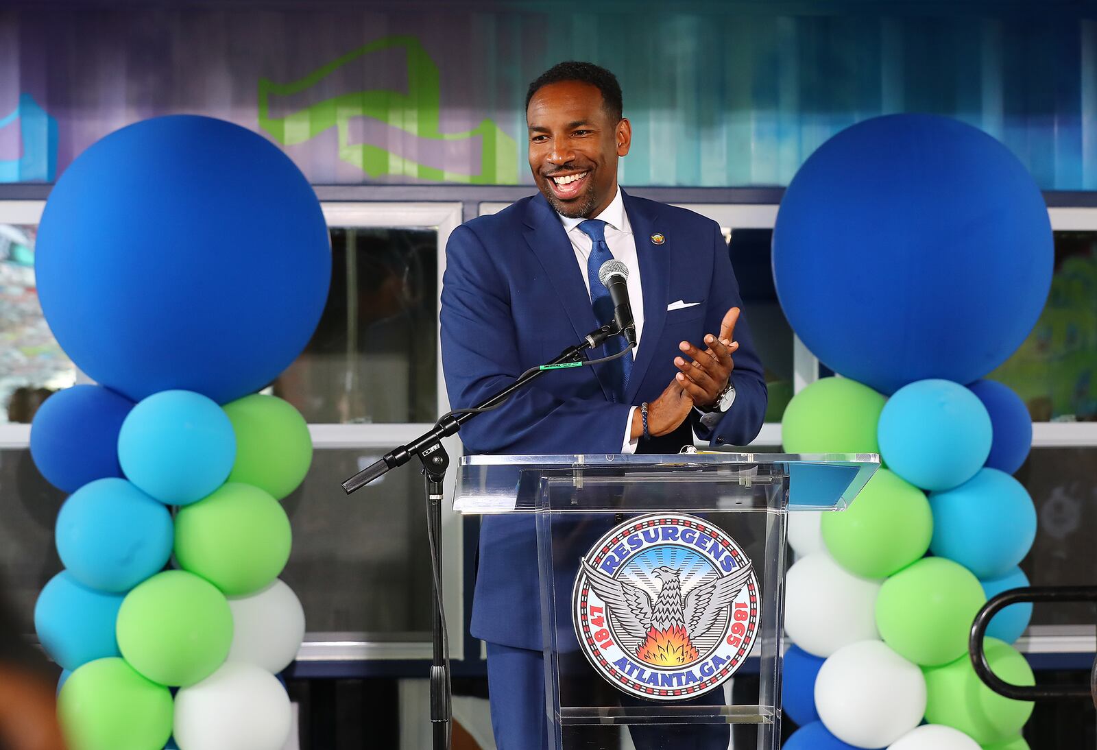 Atlanta Mayor Andre Dickens applauds the launch of the pilot program. (Curtis Compton / Curtis Compton@ajc.com)