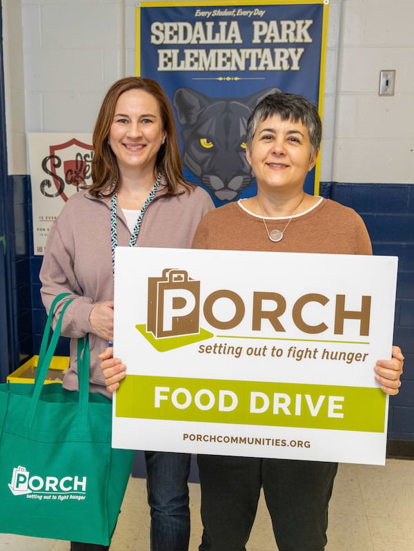 PORCH-Marietta founder Liz Platner (right) meets with Julie Lance, a Cobb County Schools social worker, at Sedalia Park Elementary School in Marietta. Porch-Marietta recently donated plenty of snacks to the school to ensure that hunger is not impeding school learning. PHIL SKINNER FOR THE ATLANTA JOURNAL-CONSTITUTION