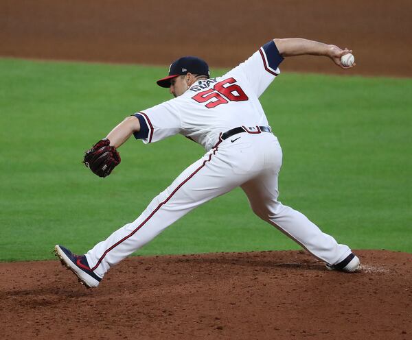 Braves pitcher Darren O'Day delivers against the Miami Marlins during the 6th inning of a 2-0 shut out of the Marlins in Game 2 of a National League Division Series at Minute Maid Park on Wednesday, Oct 7, 2020 in Houston.   “Curtis Compton / Curtis.Compton@ajc.com”