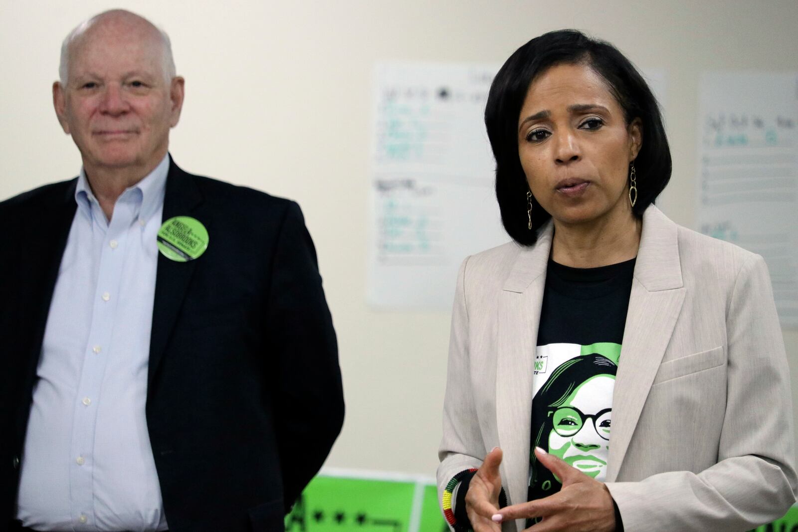 Prince George's County Executive Angela Alsobrooks, right, who is running for the U.S. Senate seat in Maryland that is opening with the retirement of Sen. Ben Cardin, left, talks to supporters during a campaign stop in Upper Marlboro, Md., on Thursday, Oct. 24, 2024. (AP Photo/Brian Witte)