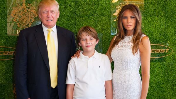 Donald Trump, son Barron, and wife Melania at the Trump Invitational Grand Prix at Mar-a-Lago, Palm Beach, Florida, January 4, 2015. (Photo by Michele Eve Sandberg/Corbis via Getty Images)