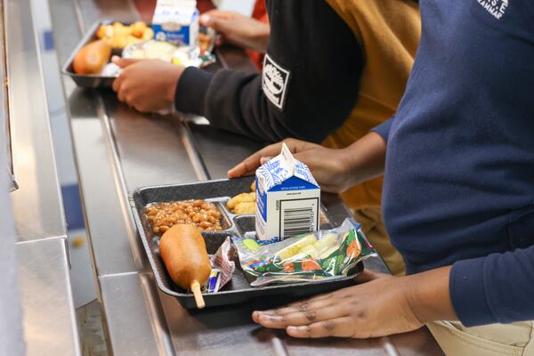 Grabbing lunch at the cafeteria at RISE Schools, on Wednesday, Feb. 22, 2023, in East Point, Ga. The RISE Prep and Grammar schools are in jeopardy of being closed by Fulton County Schools. Jason Getz / Jason.Getz@ajc.com)