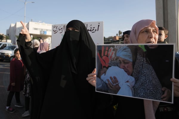 Palestinian citizens of Israel protest against Israel's military operations in the Gaza Strip and Lebanon, in Umm Al-Fahm, Israel, Saturday, Nov. 9, 2024. (AP Photo/Mahmoud Illean)