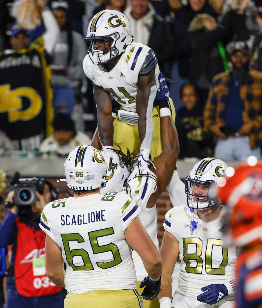 Georgia Tech Yellow Jackets running back Jamal Haynes (11) celebrates after scoring on a touchdown run during the start of the second half of an NCAA college football game between Georgia Tech and Syracuse in Atlanta on Saturday, Nov. 18, 2023.  Georgia Tech won, 31 - 22. (Bob Andres for the Atlanta Journal Constitution)