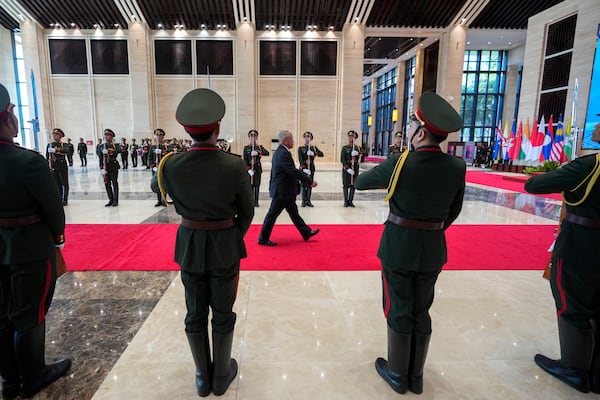 Brunei's Defense Minister II Halbi bin Haji Mohd Yussof, center, arrives to attend the Association of Southeast Asian Nations (ASEAN) defense ministers' meeting in Vientiane, Laos, Wednesday, Nov. 20, 2024. (AP Photo/Anupam Nath)