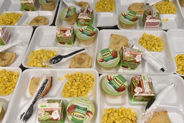 June 28, 2017 Atlanta - Meals are prepared for children at Salvation Army Boys and Girls Club Bellwood Unit in Atlanta on Wednesday, June 28, 2017. Thousands of children and teens in the United States rely on school meals. With school now out of session, the United States Department of Agriculture is organizing locations across the country to offer summer meals for these children. HYOSUB SHIN / HSHIN@AJC.COM