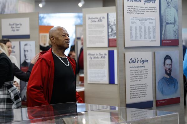 Roswell native Jimmy Taylor attends the opening of the new museum inside the Roswell Cultural Arts Center.  (Natrice Miller/natrice.miller@ajc.com)  