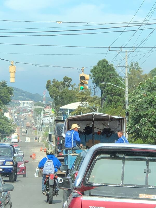 This is a traffic signal just outside of downtown San Jose, Costa Rica. Some green lights at big intersections in the city have timers before they turn yellow.