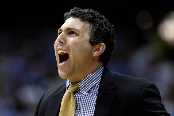 Georgia Tech coach Josh Pastner reacts during the first half of the team's NCAA college basketball game against North Carolina in Chapel Hill, N.C., Saturday, Jan. 4, 2020. (AP Photo/Gerry Broome)