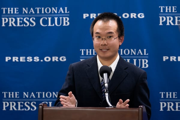 Dong Yifu, the son of imprisoned Chinese veteran journalist Dong Yuyu who was sentenced to seven years in prison on espionage charges, speaks about his father's detention to the National Press Club in Washington, Monday, Feb. 24, 2025. (AP Photo/Ben Curtis)