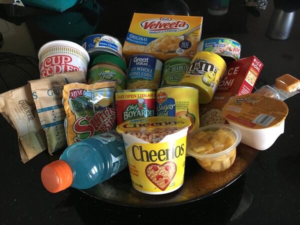 Each weekend meal program stocks its sacks and packs differently. This example from Land of Promise in College Park shows the variety of food included. Each item is chosen to be something children can prepare on their own while still providing good nutrition for the weekend. CONTRIBUTED BY LAND OF PROMISE