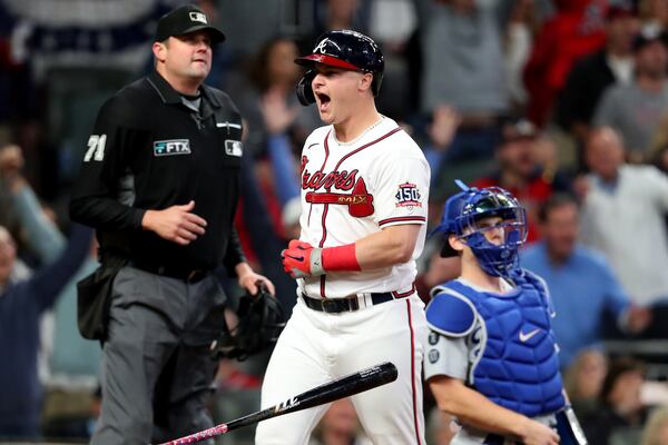 Braves rightfielder Joc Pederson reacts after hitting a two-run home run during the fourth inning against the Los Angeles Dodgers in Game 2 of the NLCS Sunday, Oct. 17, 2021, at Truist Park in Atlanta. (Curtis Compton / curtis.compton@ajc.com)