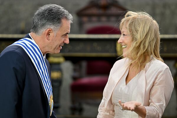 Uruguay's incoming President Yamandu Orsi and Vice President Carolina Cosse attend an Inauguration Day ceremony, in Montevideo, Uruguay, Saturday, March 1, 2025. (AP Photo/Matilde Campodonico)