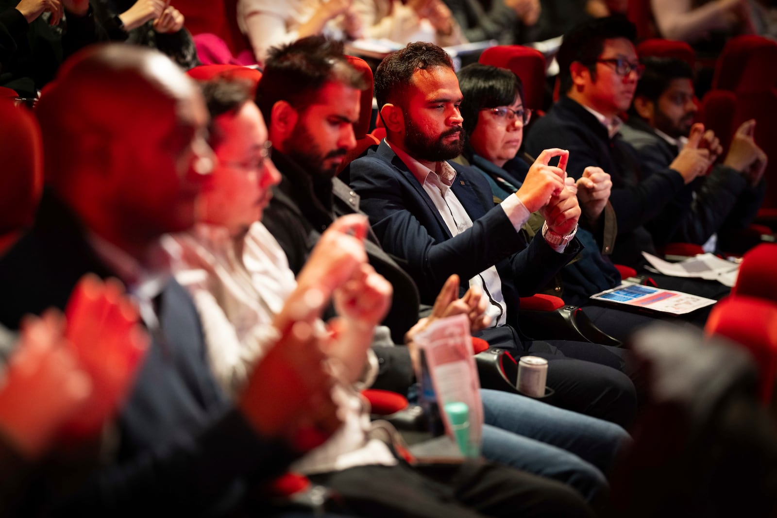 Front of house cinema staff learn British Sign Language at Cineworld Leicester Square, on Wednesday, Oct. 2, 2024 in London. (Photo by Scott A Garfitt/Invision/AP)