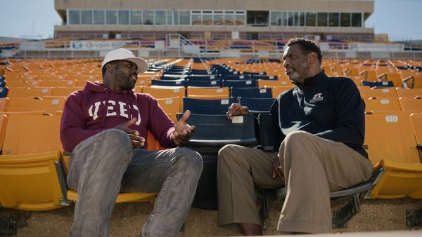 Former NFL quarterbacks Michael Vick and Doug Williams.