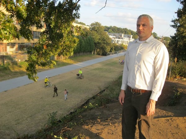 Ryan Gravel, the former Georgia Tech student whose doctoral thesis was the blueprint for Atlanta’s Beltline, stands on his favorite spot, a hill looming over the Eastside Trail not far from North Avenue. The long-awaited segment of Beltline officially opens Monday.