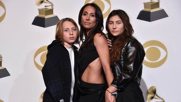 Christopher Nicholas Cornell, Vicky Karayiannis and Toni Cornell pose in the press room during the 61st Annual Grammy Awards at Staples Center on February 10, 2019 in Los Angeles, California.