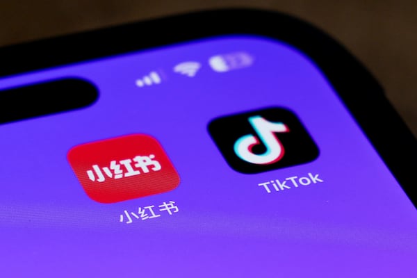 Icons for the smartphone apps Xiaohongshu and TikTok are seen on a smartphone screen in Beijing on Jan. 14. (AP Photo/Andy Wong)