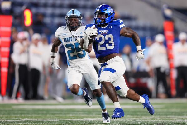 Georgia State running back Marcus Carroll (23) breaks loose for a 63-yard run during the second half against Rhode Island at Center Parc Stadium, Thursday, August 31, 2023, in Atlanta. Carroll had a career-high 184 yards and three touchdowns. Georgia State won 42-35. (Jason Getz / Jason.Getz@ajc.com)